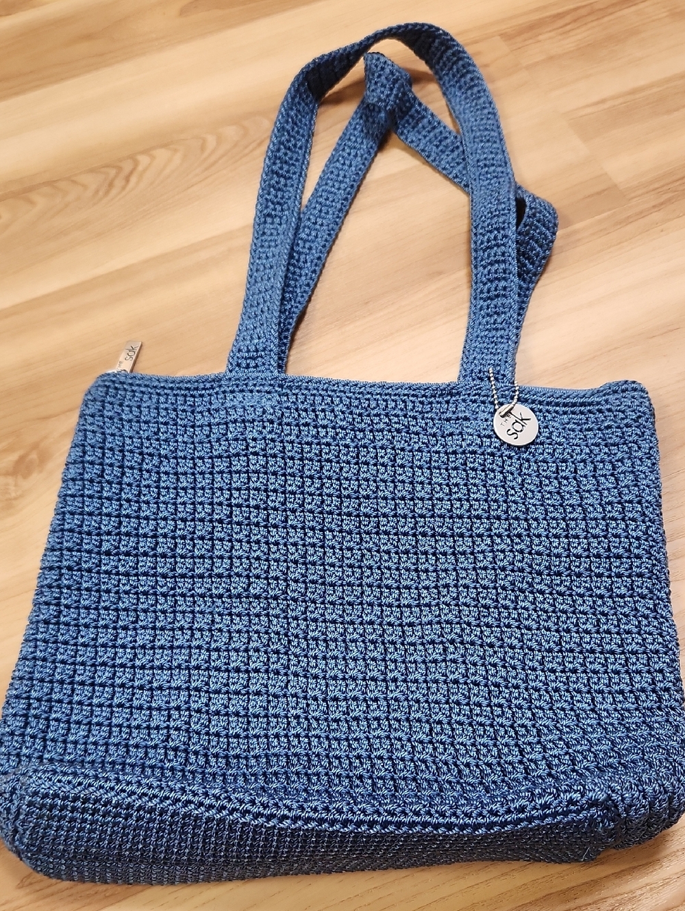 The Sak Denim Blue Crochet Tote with Branded Charm